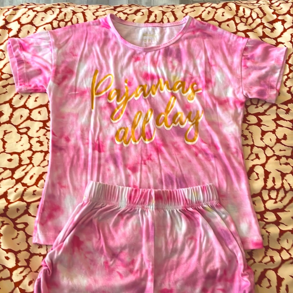 Pink Pj's that read "Pajamas all day"